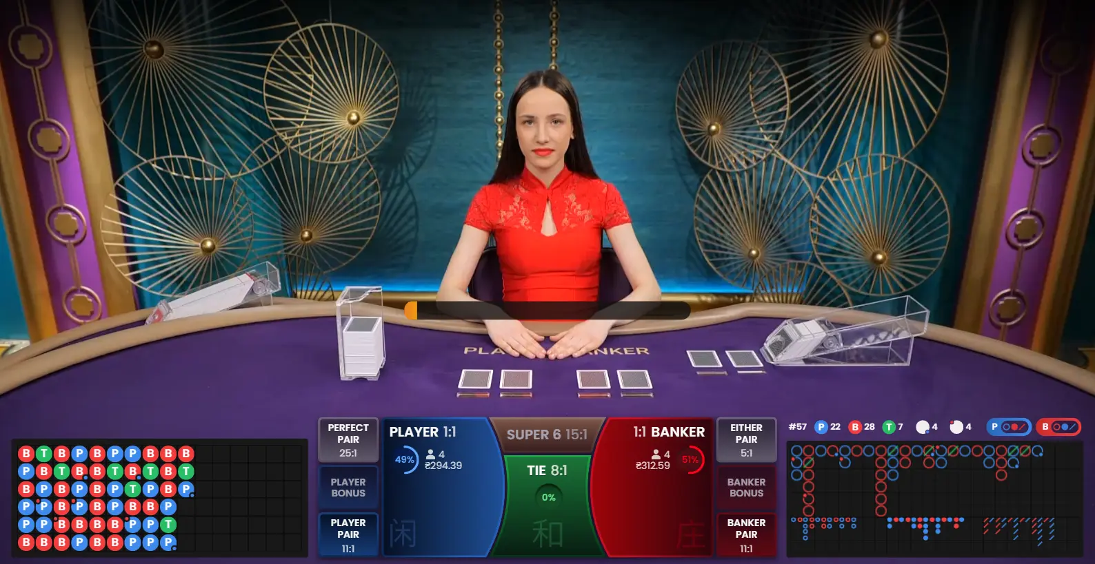 With cards fanned out perfectly, the dealer demonstrates impeccable skill sliding out new cards from the shoe to continually keep the baccarat action running fluidly.